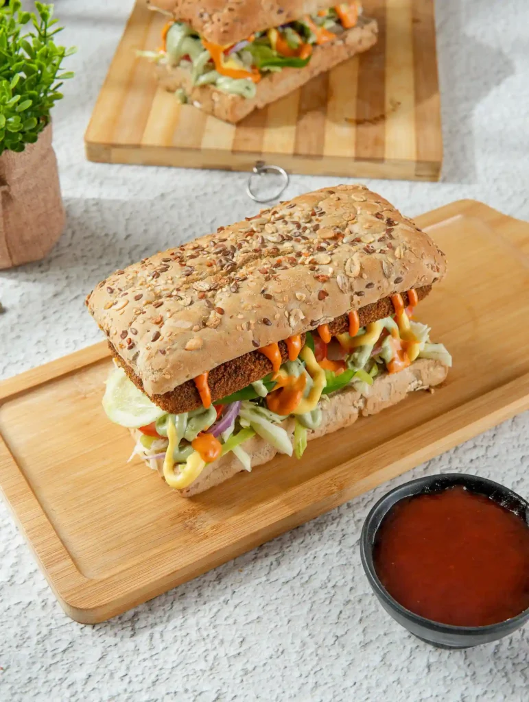 Heavy veg loaded hamburger with red sauce